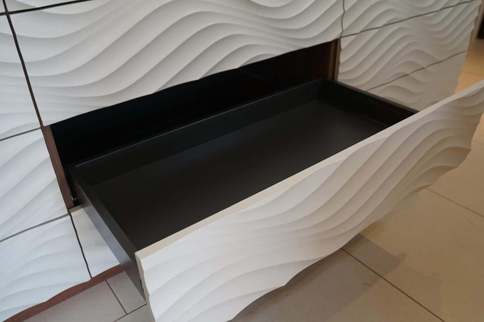 Graphite Atira push-to-open drawer extended showing storage potential
